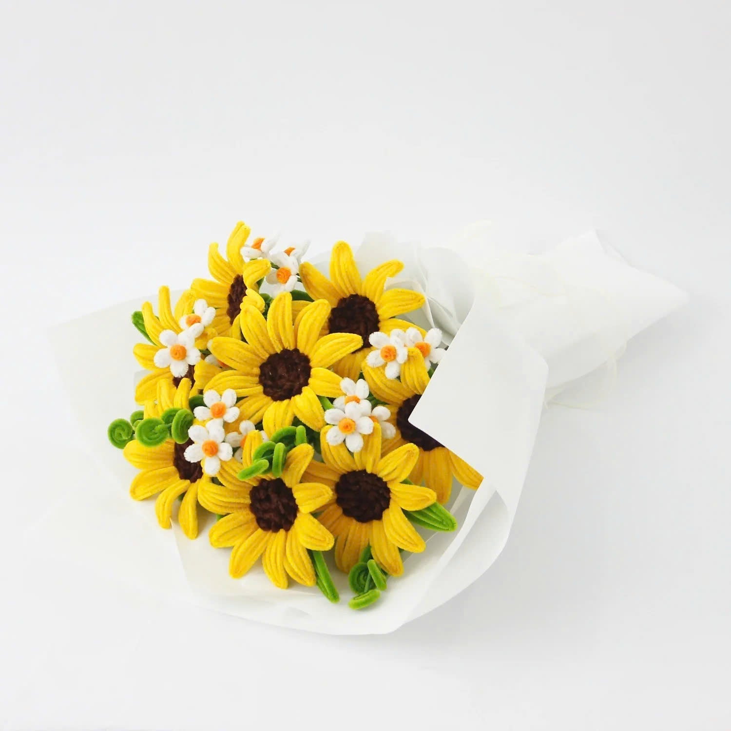 Honey Glow DIY bouquet featuring bright yellow sunflowers and small white daisies made from pipe cleaners, wrapped in soft white paper.